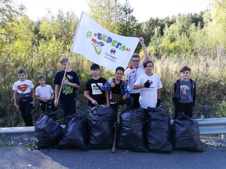 Саянские гидроэнергетики и школьники собрали на берегах Енисея 200 мешков мусора во время акции «оБЕРЕГАй»