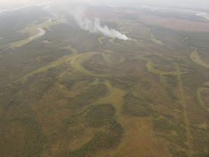 Лесной пожар в Момском улусе Якутии приближается к селу Соболох