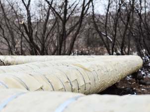 Сибирская генерирующая компания меняет изоляцию на теплотрассе в Заводском районе Новокузнецка